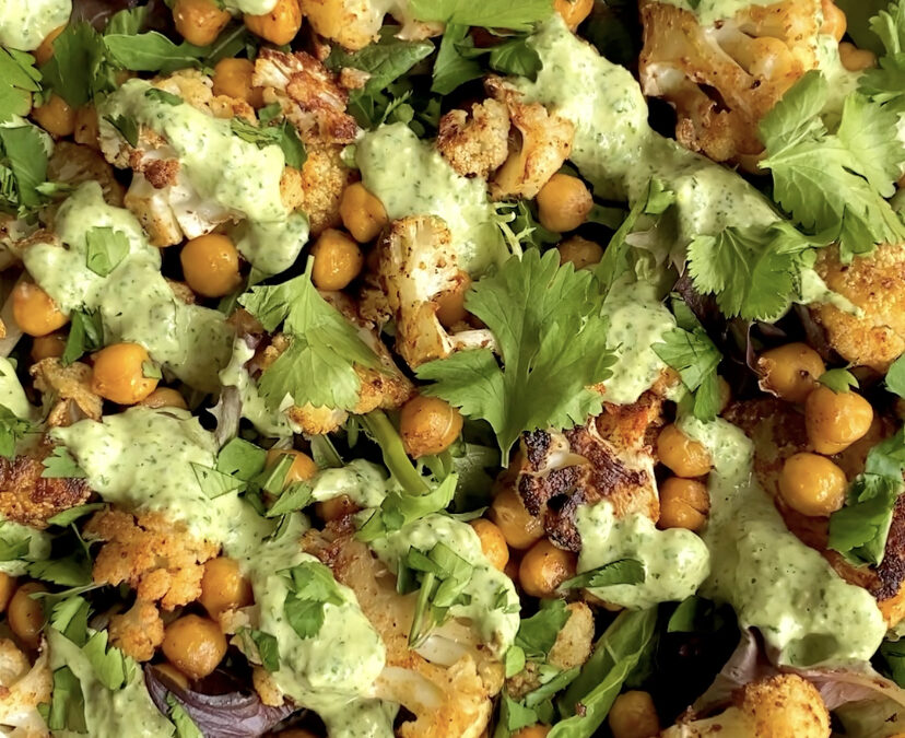 Crispy Cauliflower and Chickpea Salad with an Herby, Garlic Tahini Sauce